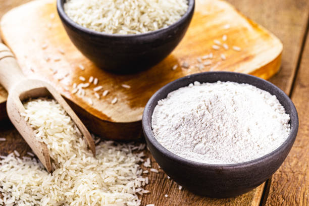 istock rice flour with raw rice pot on the side, culinary ingredient 1304420353