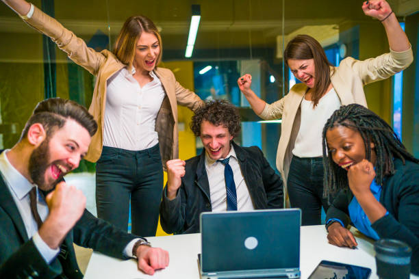 istock Business team employees celebrating success 1304421365