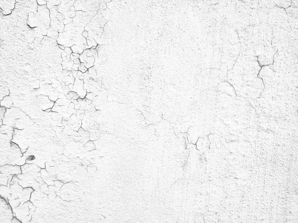 istock Old cracked gray white obsolete wall texture background 1304426373