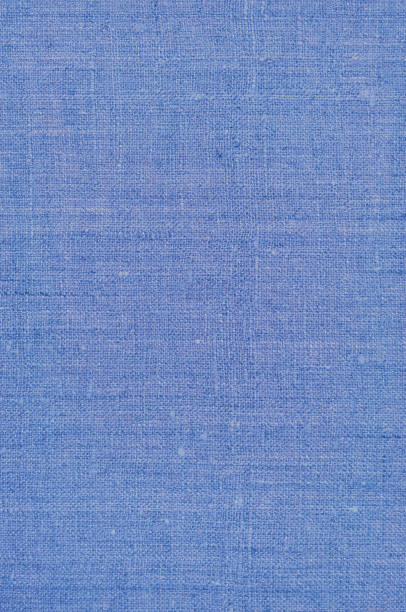 istock Natural dark pastel pale blue rustic flax fiber linen fabric swatch texture pattern, vertical bright rough detailed vintage textile background macro closeup, crumpled textured burlap canvas copy space wallpaper 1304426392