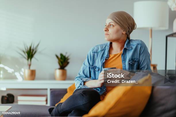Cancer Patient Looking Far Wearing Headscarf Stock Photo - Download Image Now - Cancer - Illness, Patient, Chemotherapy Drug