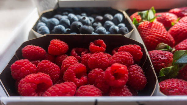 istock Blueberries, raspberries and strawberries 1304430223