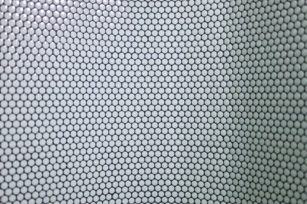 istock round tile wall on a black background in a public space 1304431132
