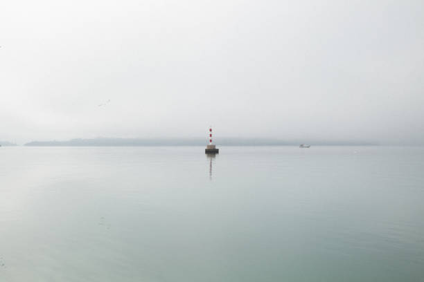 istock Beacon in the fog. 1304431773