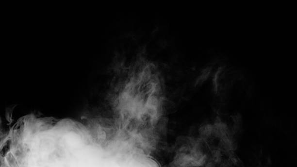 istock White smoke or fog isolated on black background. 1304432812