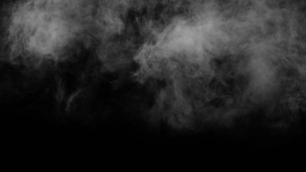 istock White smoke or fog isolated on black background. 1304432819