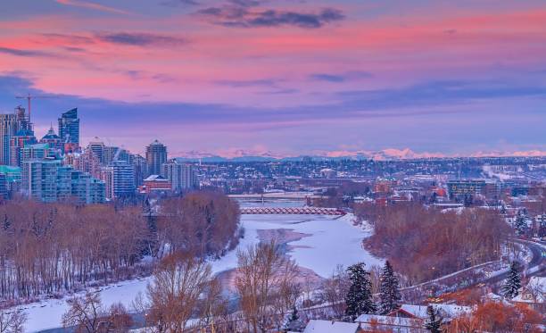 istock Warm Sunrise Clouds Over The Calgary River Valley 1304432907