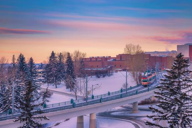 istock City Train Crossing The Track At Sunrise 1304432952