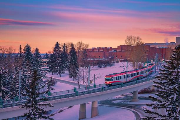 istock City Train Crossing The Track At Sunrise 1304432988
