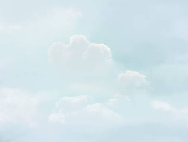 Blurred soft background. Cumulus clouds in a haze. Backdrop for design