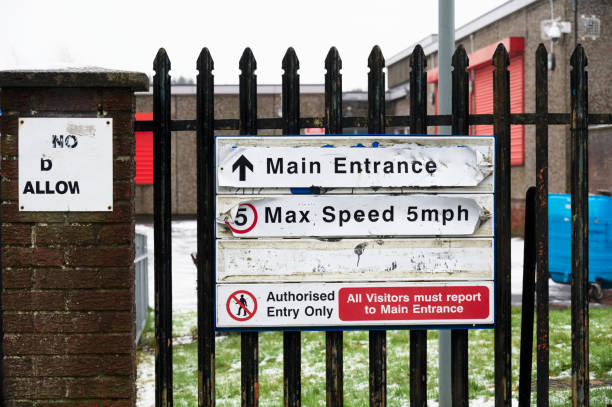 istock Construction building site sign at entrance on gate 1304433818