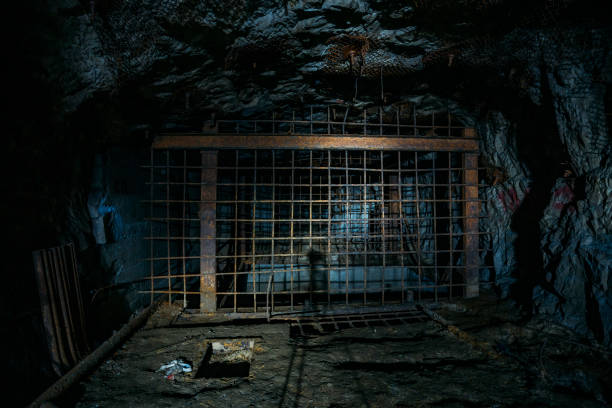 Dark and dirty abandoned uranium mine tunnel