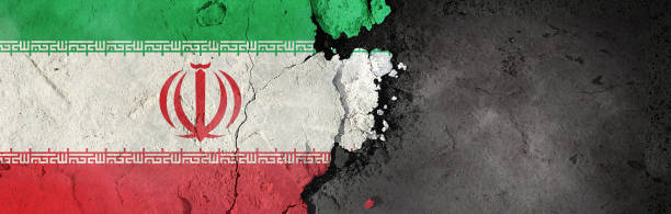 istock Iran flag on a rough background. Broken and cracked background. 1304435823