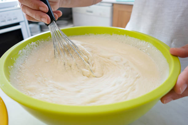 istock Woman preparing pancake batter 1304437425