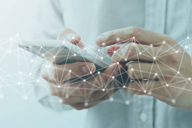 istock Close up of hands holding smartphone. 1304450715