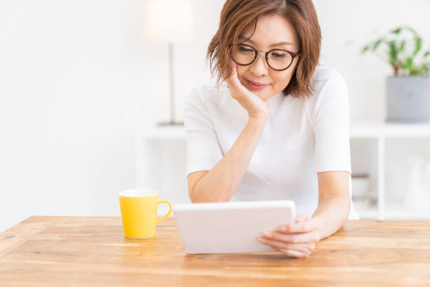 istock senior age woman who uses tablet computer 1304457430