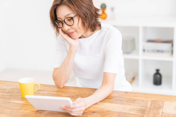 istock senior age woman who uses tablet computer 1304457453