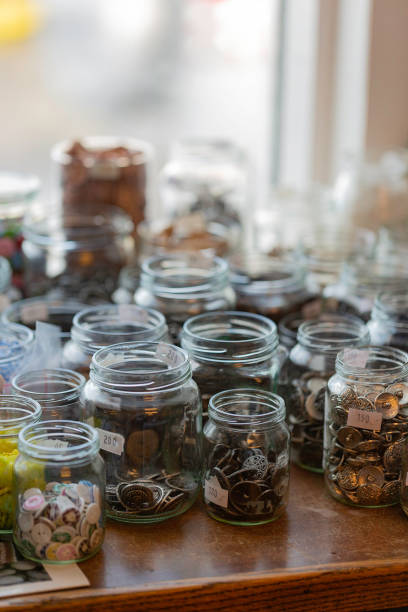 istock Jars of buttons 1304460080