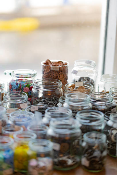 istock Jars of buttons 1304460084