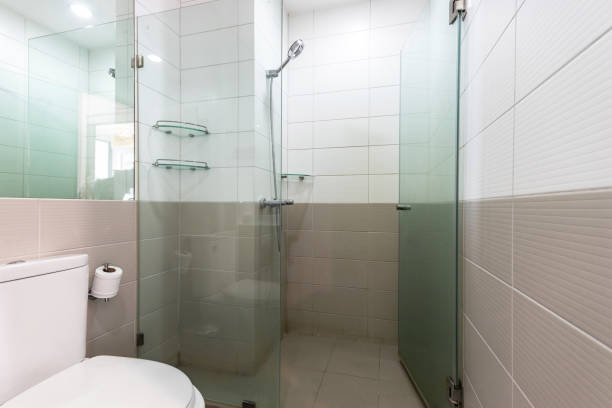 istock Clean and white bathroom with amenities. 1304461613