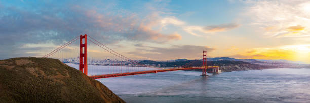 Panorama view of Golden Gate bridge on sunset time. Panorama view of Golden Gate bridge on sunset time, San Francisco, USA. golden gate bridge stock pictures, royalty-free photos & images