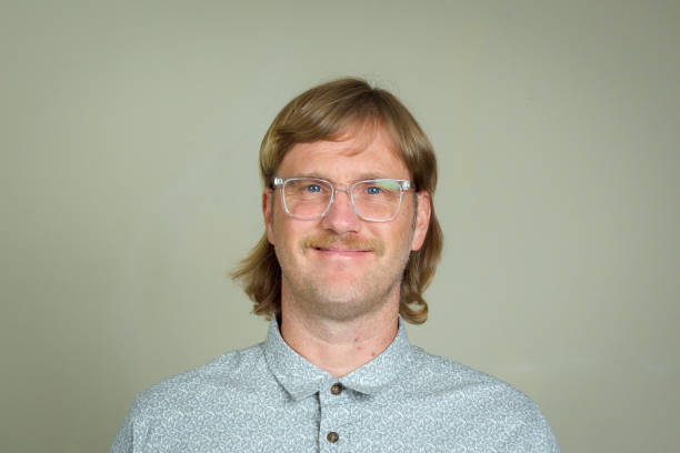 Mullet Happy man with mullet and glasses 1980 stock pictures, royalty-free photos & images