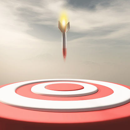 Rocket missile falling to a red target . Target audience and strategy concept . This is a 3d render illustration .