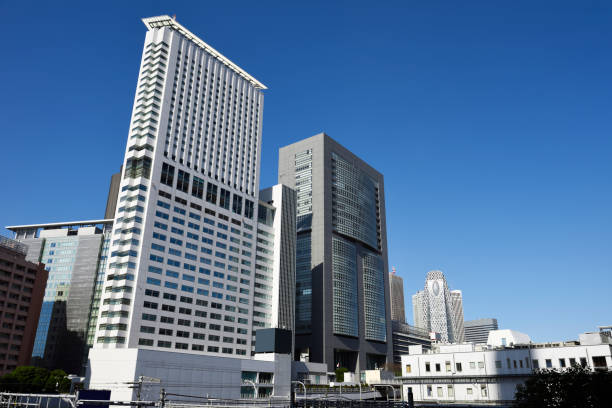 istock Tokyo Shinjuku skyline against clear sky 1304474009