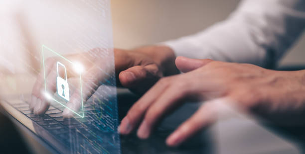 istock Technology concept with cyber security internet and networking, Businessman hand working on laptop, screen padlock icon on digital display. 1304474830