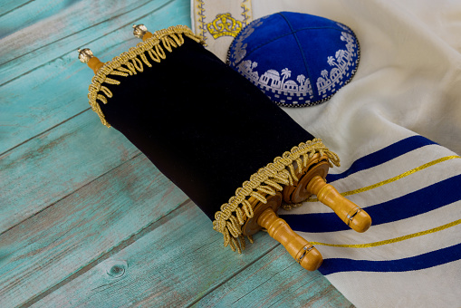 Prayer shawl kippa Jewish Orthodox prayer religious symbol with torah scroll
