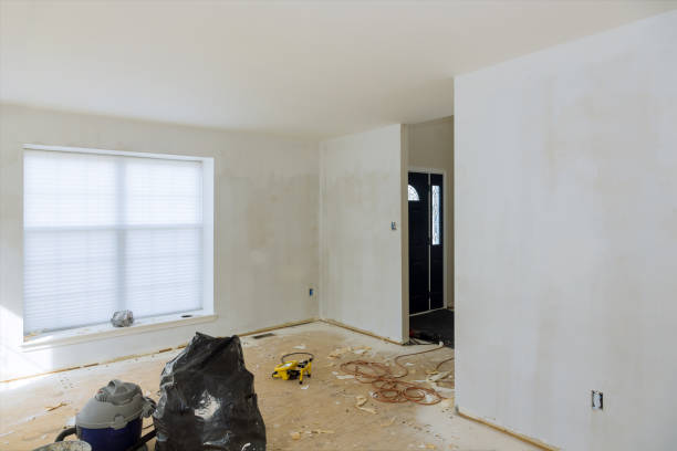 istock Remodeling renovation home improvement apartment putty plasterboard wall in plastering wall repairs at home. 1304478791