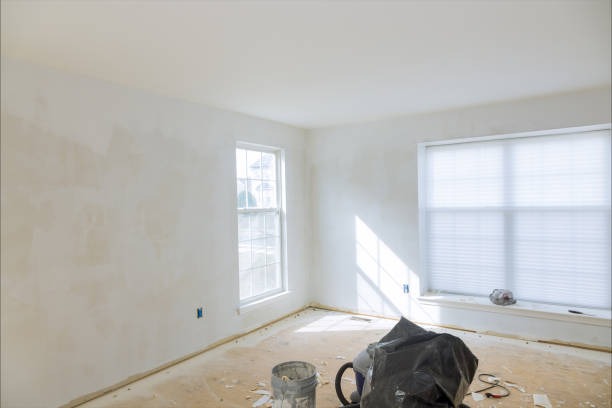 istock Home remodel of drywall puttying, sealing cracks with gypsum plaster using a spatula. 1304478792