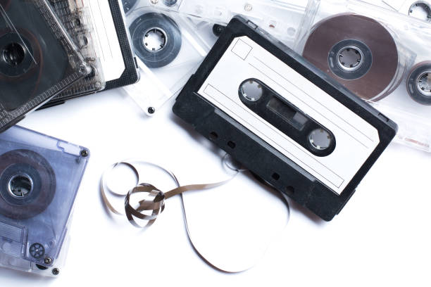 istock Old audio cassettes on white background 1304485383