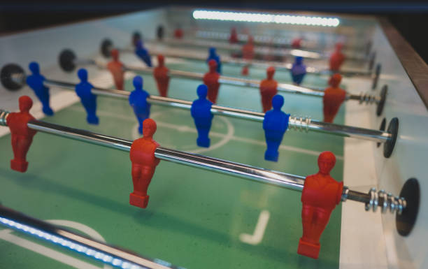 istock Table football game with red and blue players. 1304486576