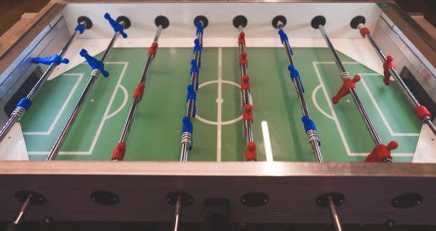 istock Table football game with red and blue players. 1304486583
