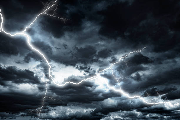 istock Lightning strike against the background of a cloudy sky. 1304487933