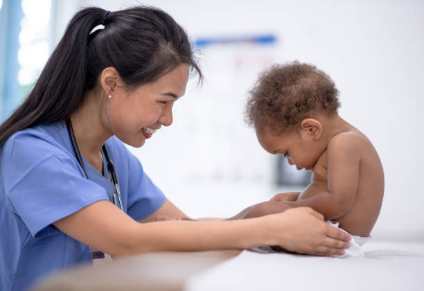istock Adorable baby has medical check-up 1304488575