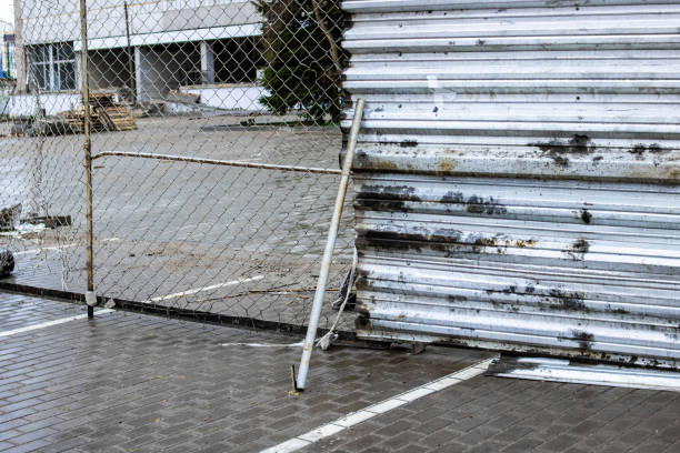 istock Metal fence at the construction site closeup 1304488960