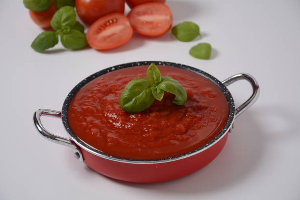 istock Italian tomato sauce with basil, onion and garlic 1304493138