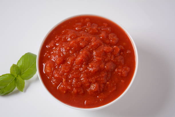 istock Italian tomato sauce with basil, onion and garlic 1304493148