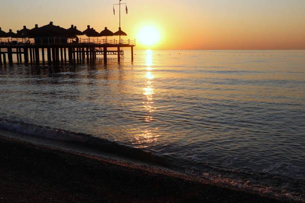 istock Bright orange evening sunset over the Mediterranean sea. 1304493600