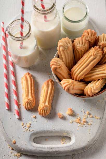 istock Shortbread cookies served with milk and straw 1304494172