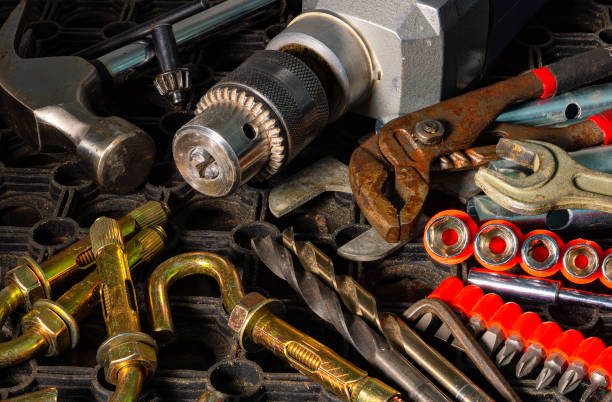 istock Drill and anchor bolts surrounded by other materials 1304494855