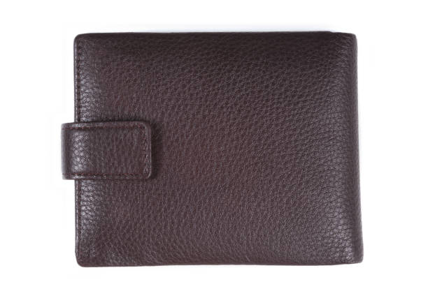 istock New men's wallet. Brown wallet isolated on white background. 1304496051