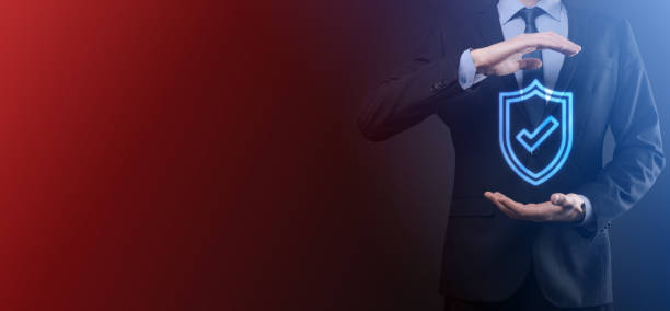 istock Protection network security computer in the hands of a businessman. business, technology, cyber security and internet concept - businessman pressing shield button on virtual screens Data protection 1304502883