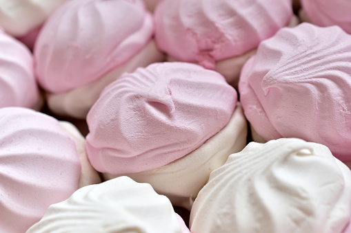Pink and white marshmallow close up in a box
