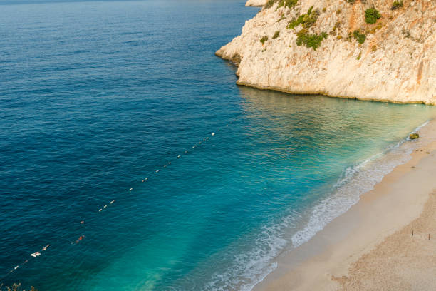 istock Kaputas beach, Turkey. Beautiful turquoise beach with sun 1304506933