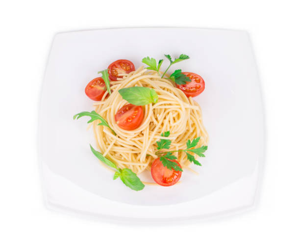 istock Italian pasta with basil and tomatoes. 1304510796
