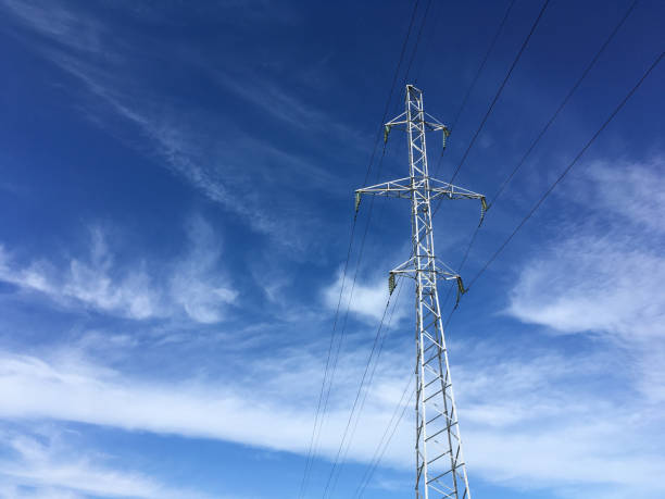 istock Clear electric post on blue sky on sunny day 1304518898