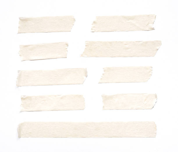 close up of adhesive tape on white background close up of adhesive tape on white background bandage photos stock pictures, royalty-free photos & images